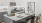 a kitchen with white cabinets