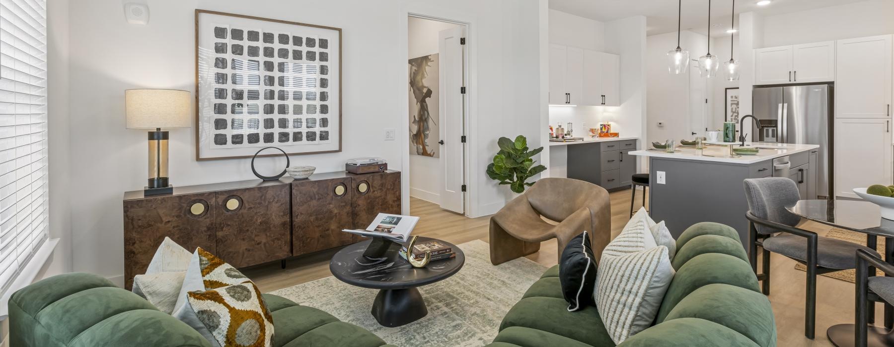 a living room with a green couch