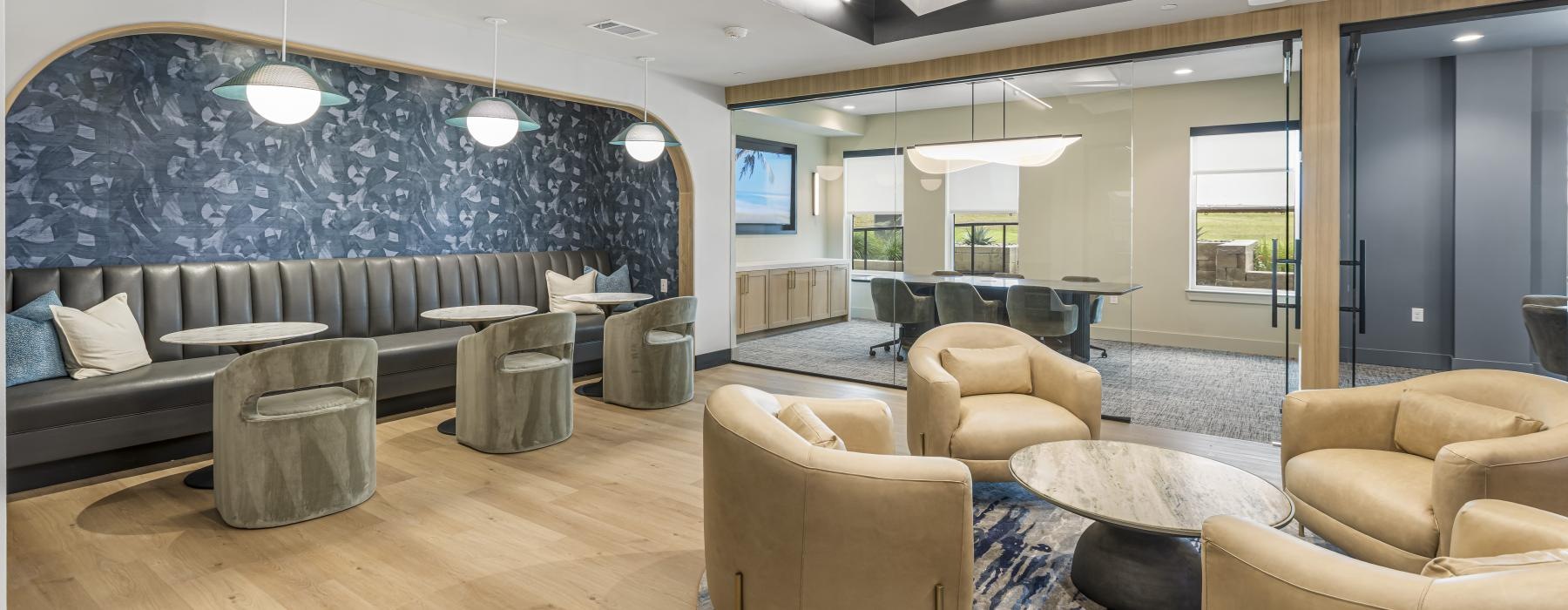 a room with couches and a table